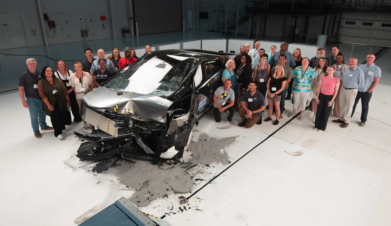 2025 Crash Science Trainers pose with the Tesla Cybertruck Post-test